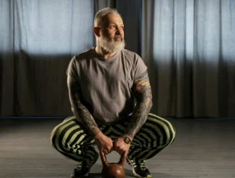 Elder man with tattoos