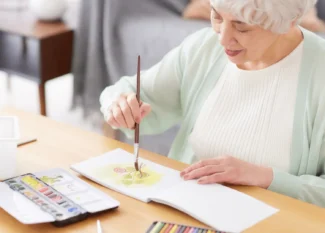 a Senior busy in painting Activity Ideas