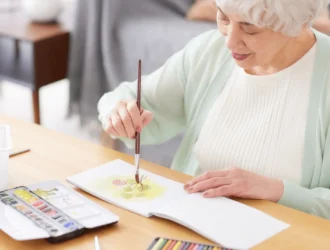 a Senior busy in painting Activity Ideas