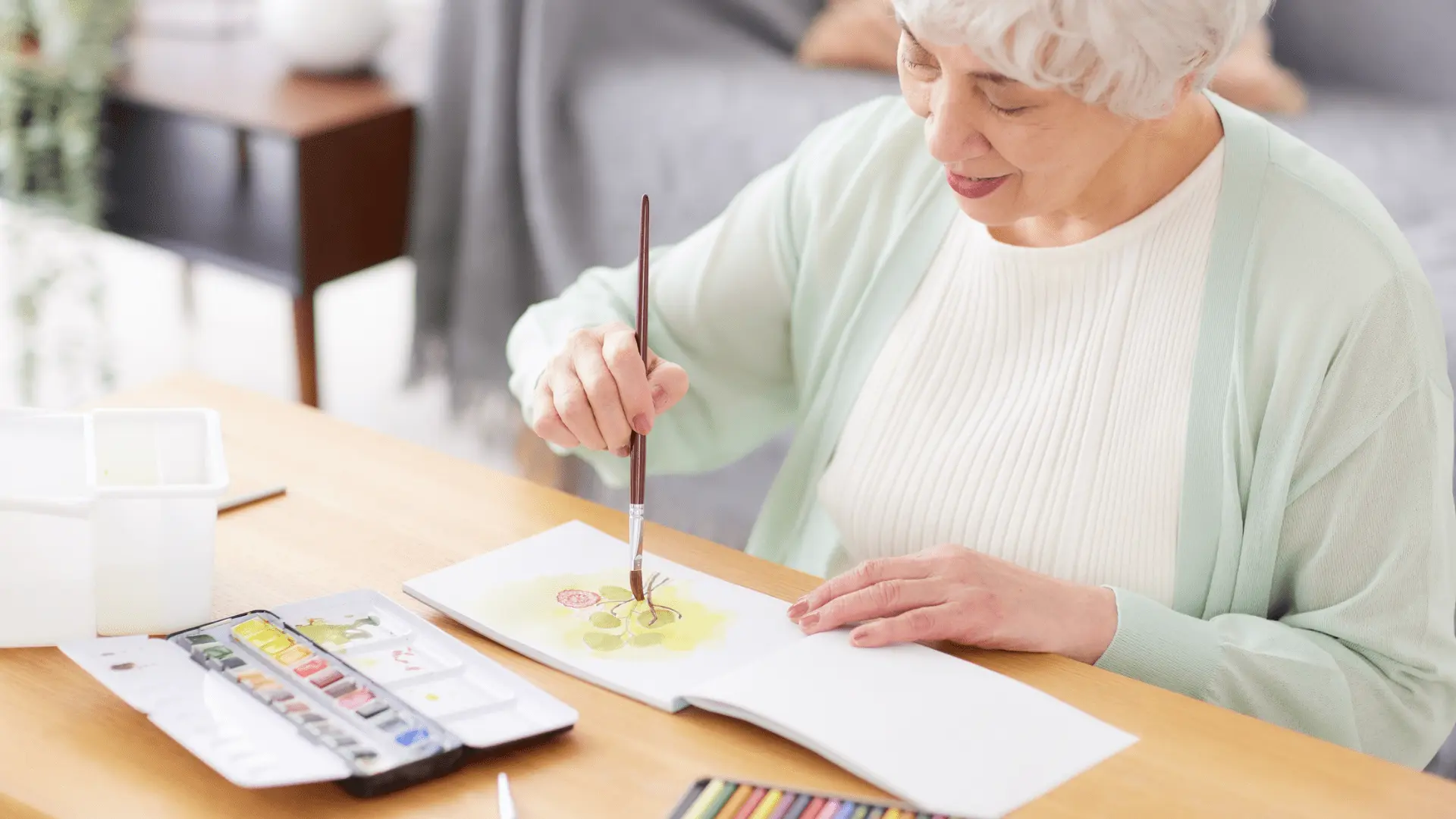 a Senior busy in painting Activity Ideas