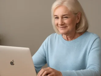Senior woman using a laptop to explore free Optimum internet packages for seniors