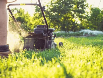 Lawn mower cutting grass for free yard work for seniors