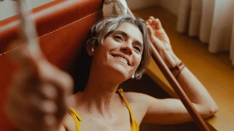 Senior woman smiling and feeling comfortable, showcasing a relaxed, confident expression, ideal for seniors seeking the best support bras for comfort and style.