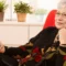 Senior woman using a landline phone at home, enjoying a conversation with clear sound and ease